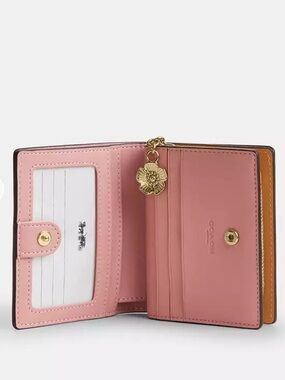 NWT PINK POWDER COACH Snap Wallet with charm